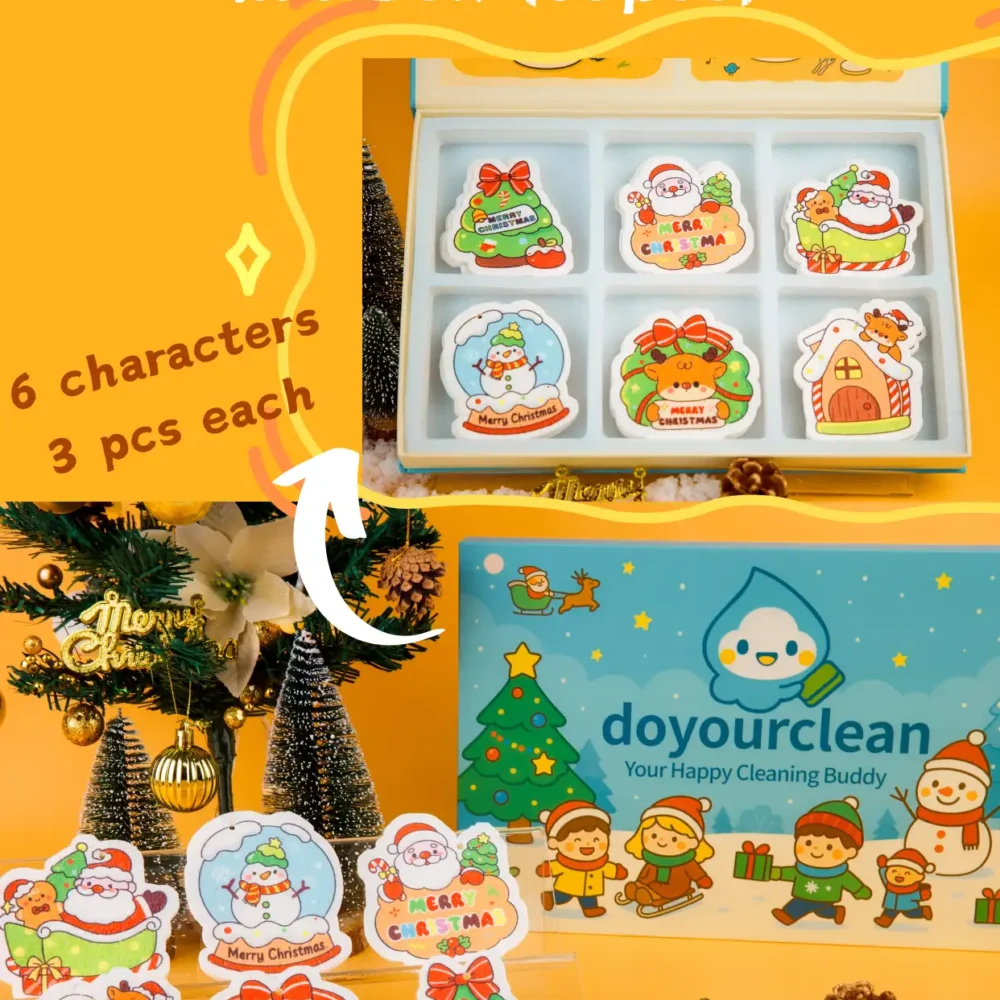 DoYourClean Santa Friends 18-piece cellulose sponge gift box with six cute Santa-themed characters on an orange background.