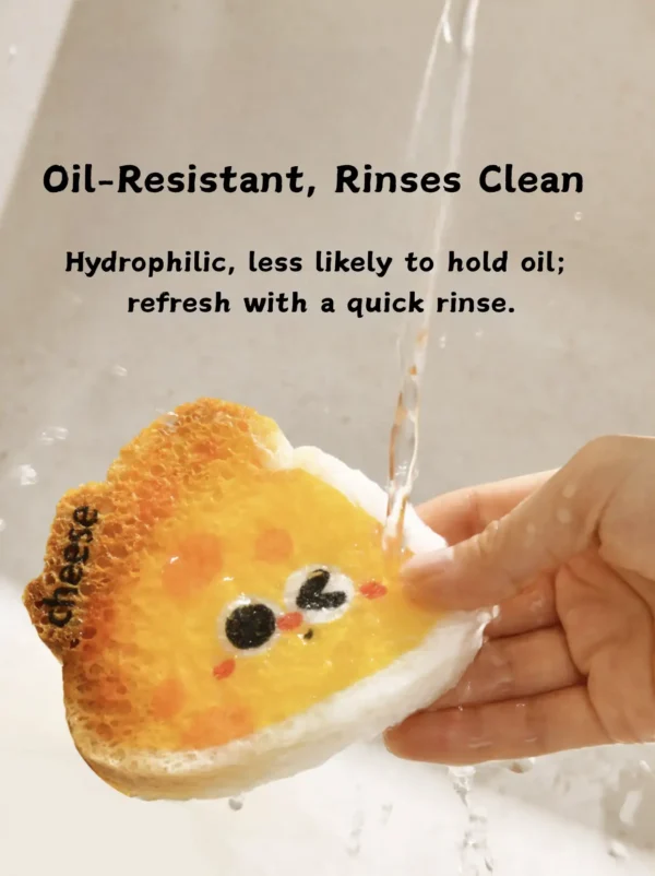 Cheese-shaped cellulose sponge rinsing clean under running water