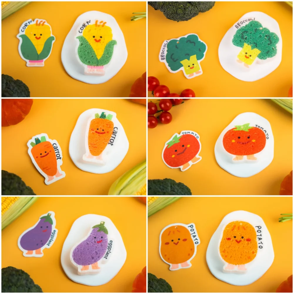 Cute vegetable-shaped cellulose sponges on yellow background – corn, broccoli, carrot, tomato, eggplant and potato – DoYourClean Vegetable Friends set
